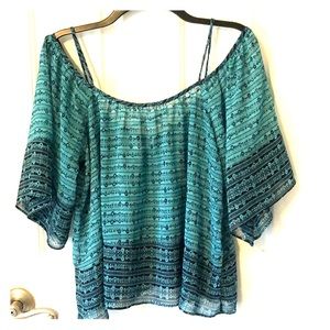 Sheer dolman cold shoulder top.
